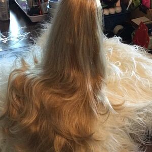 Synthetic ponytail hair piece blondish colors clip on to your hair for length